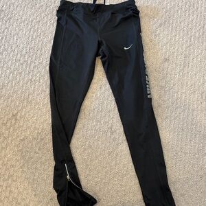 Nike Kids Black Leggings with Silver Logo